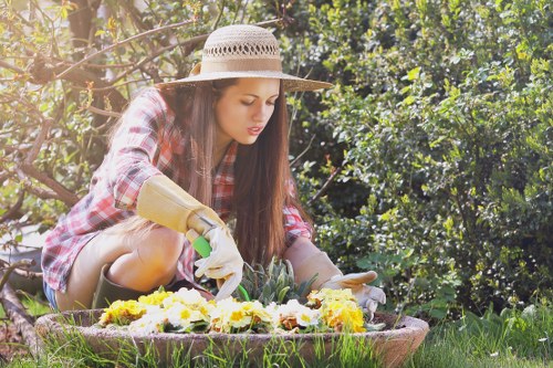 Gardener Chingford planting seasonal flowers
